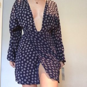 Low v Reformation dress with front slit